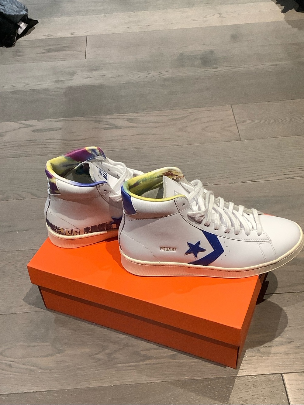 Converse White High-Top Sneakers with Blue Chevron and Multicolor Graphic